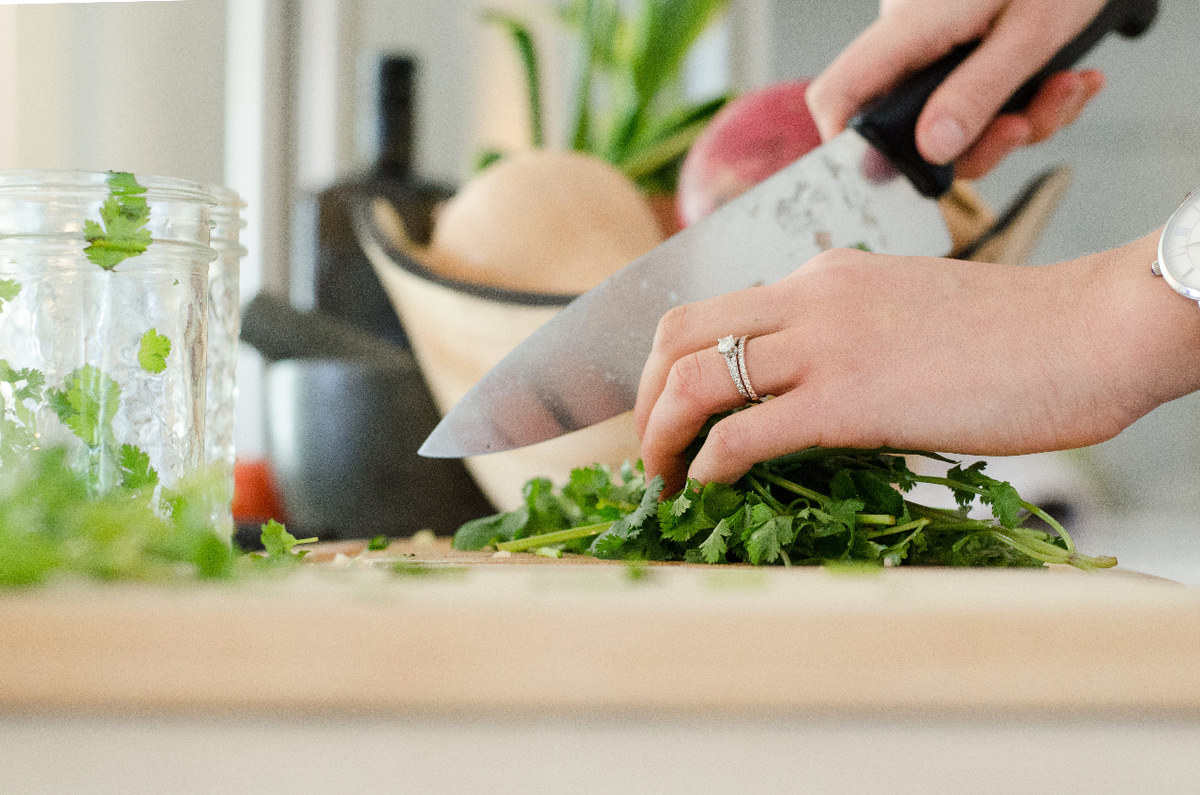 Person chopping vegetables